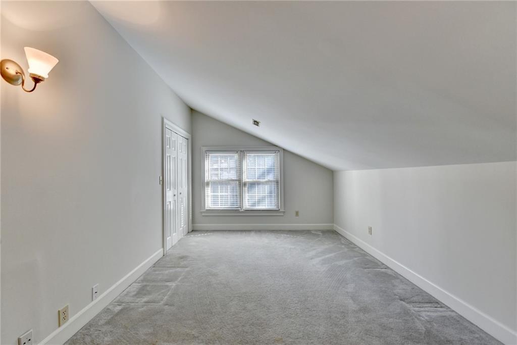 2859 Village Court Gainesville, GA 30506 - Photo 21 of 27 a view of an empty room with a window