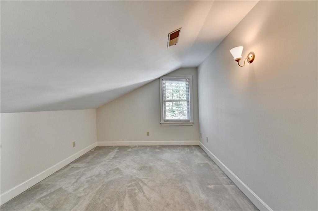 2859 Village Court Gainesville, GA 30506 - Photo 23 of 27 an empty room with windows