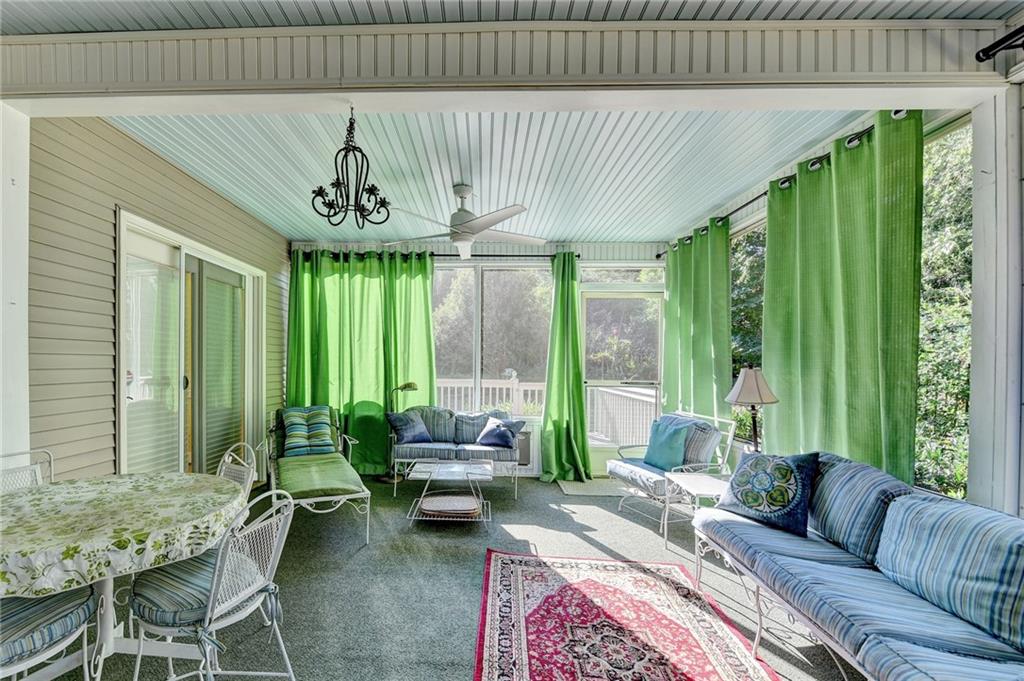 2859 Village Court Gainesville, GA 30506 - Photo 24 of 27 a living room with furniture and a large window