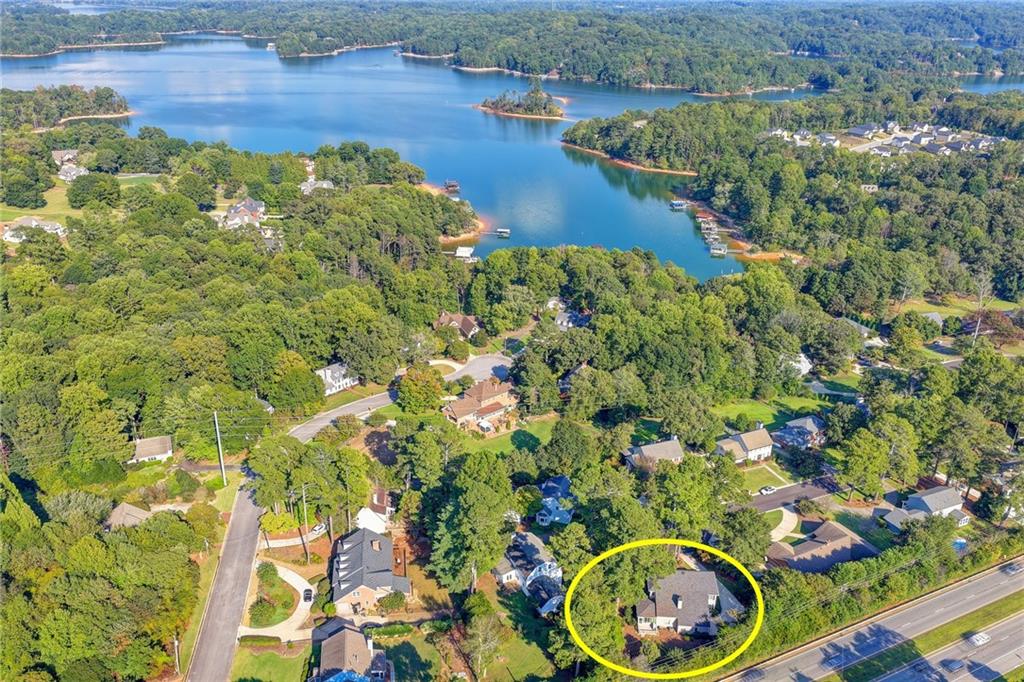 2859 Village Court Gainesville, GA 30506 - Photo 27 of 27 a view of a lake with a house in a background