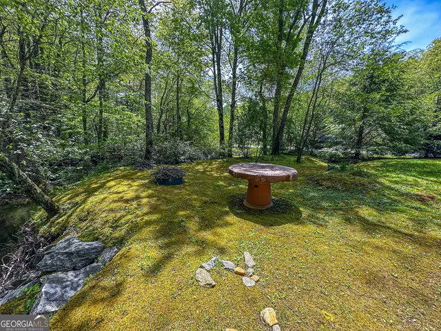 a view of a fountain with an outdoor space