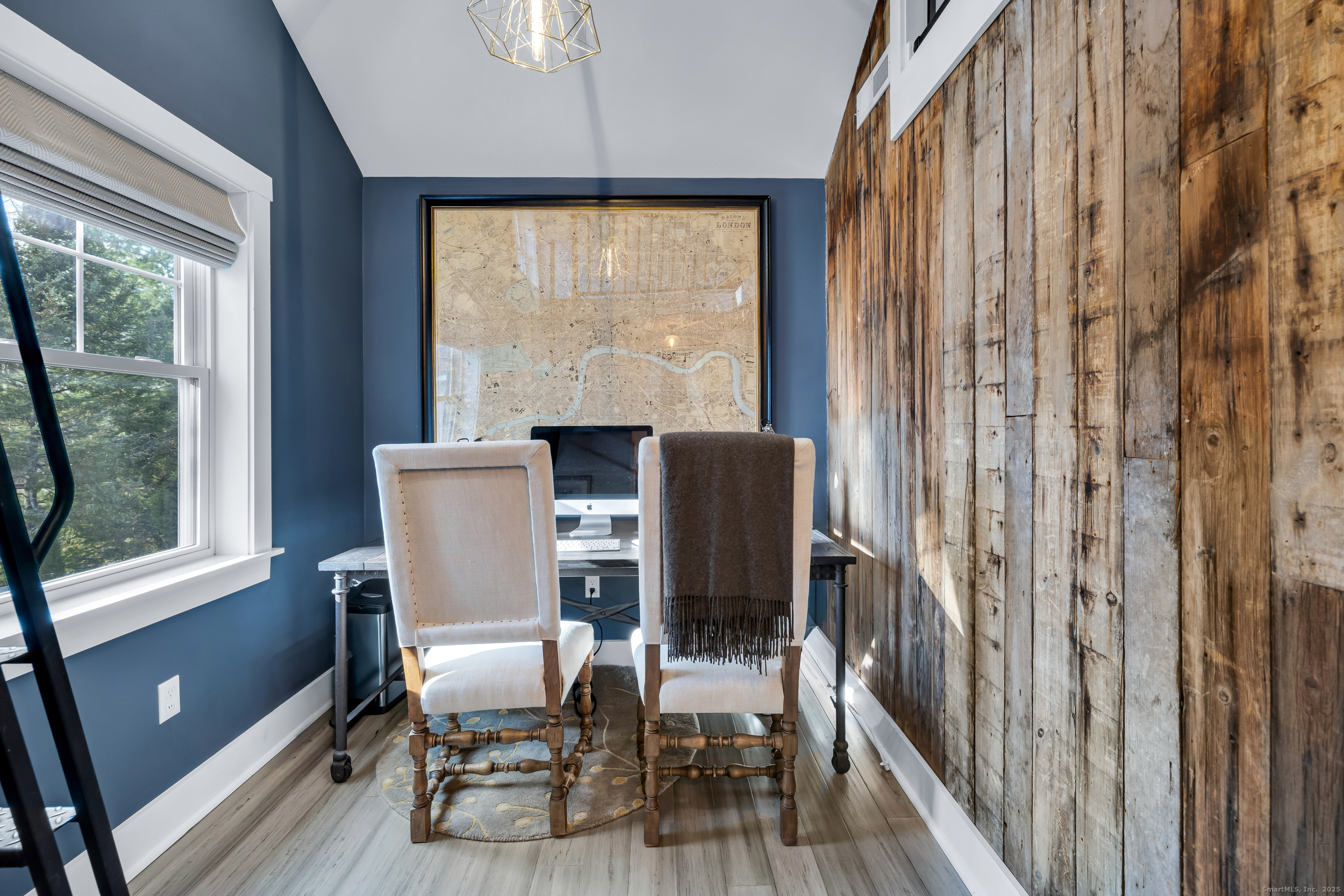 285 Old Whitfield Street Guilford, CT 06437 - Photo 25 of 40 An open office area designed for today's work-from-home lifestyle, featuring a lovely reclaimed-wood accent wall for added charm.