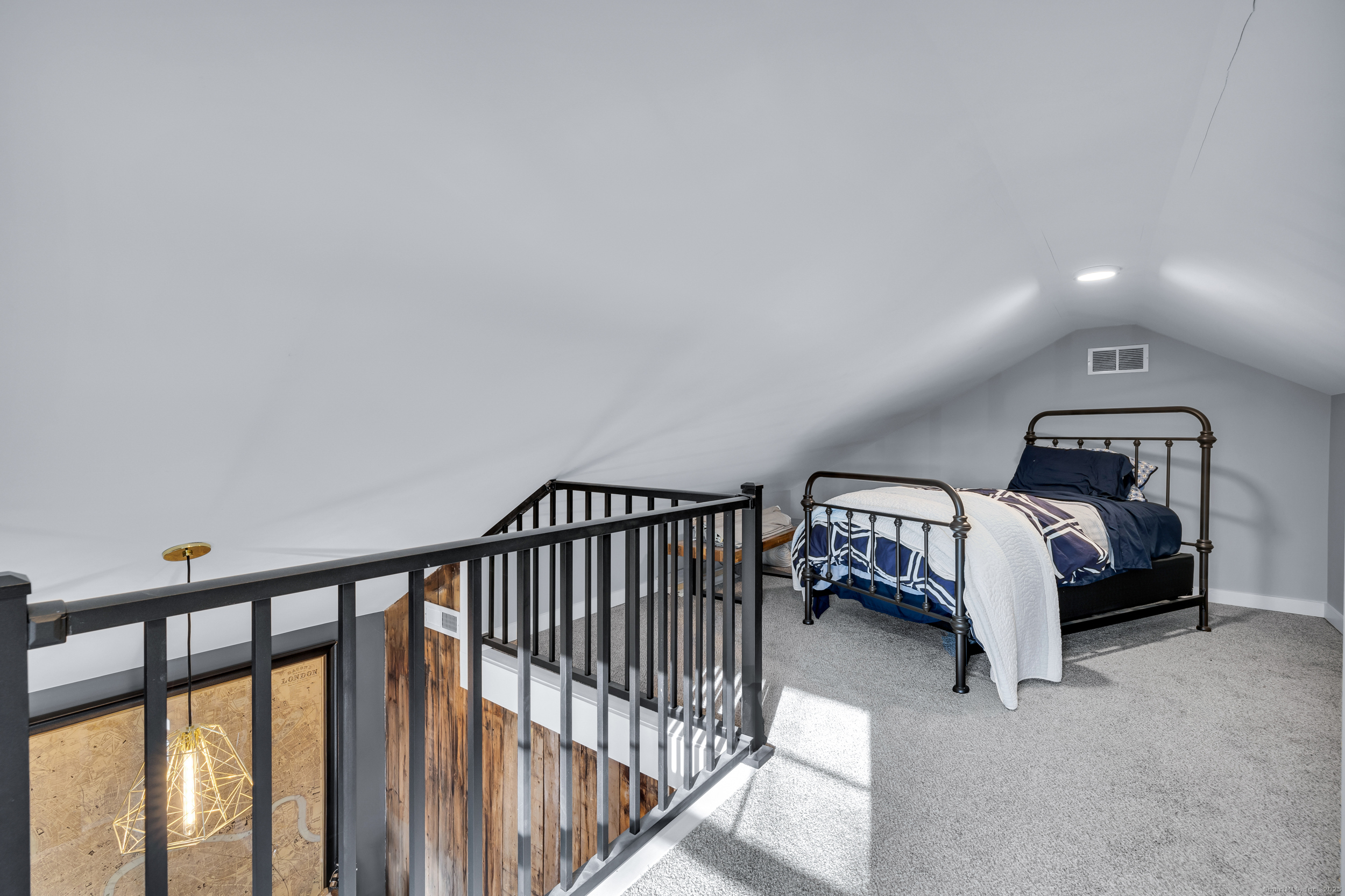 285 Old Whitfield Street Guilford, CT 06437 - Photo 27 of 40 The loft area off the open office provides a charming nook-perfect for kids' sleepovers or additional storage.