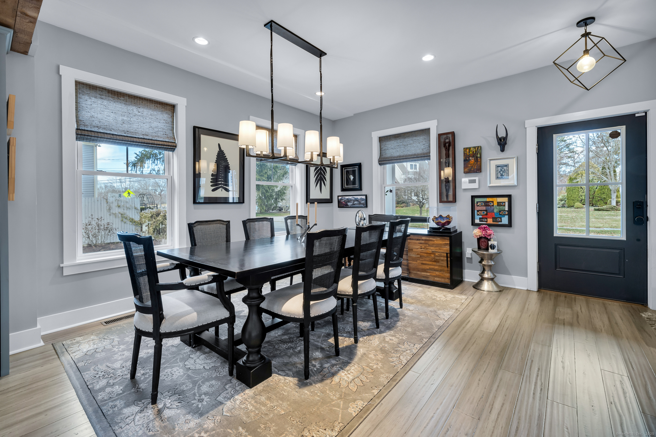 285 Old Whitfield Street Guilford, CT 06437 - Photo 5 of 40 Features include 9-foot ceilings, recessed lighting, including a Restoration Hardware lighting fixture above the dining area.