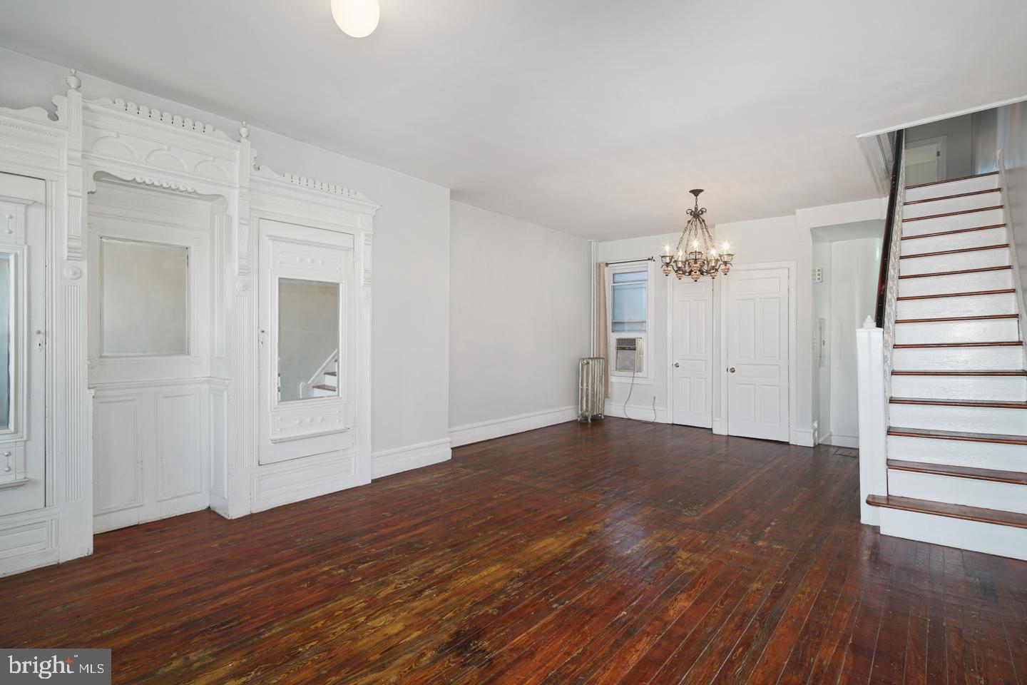 2324 Poplar Street, Unit 2F Philadelphia, PA 19130 - Photo 13 of 24 wooden floor in an empty room with a window