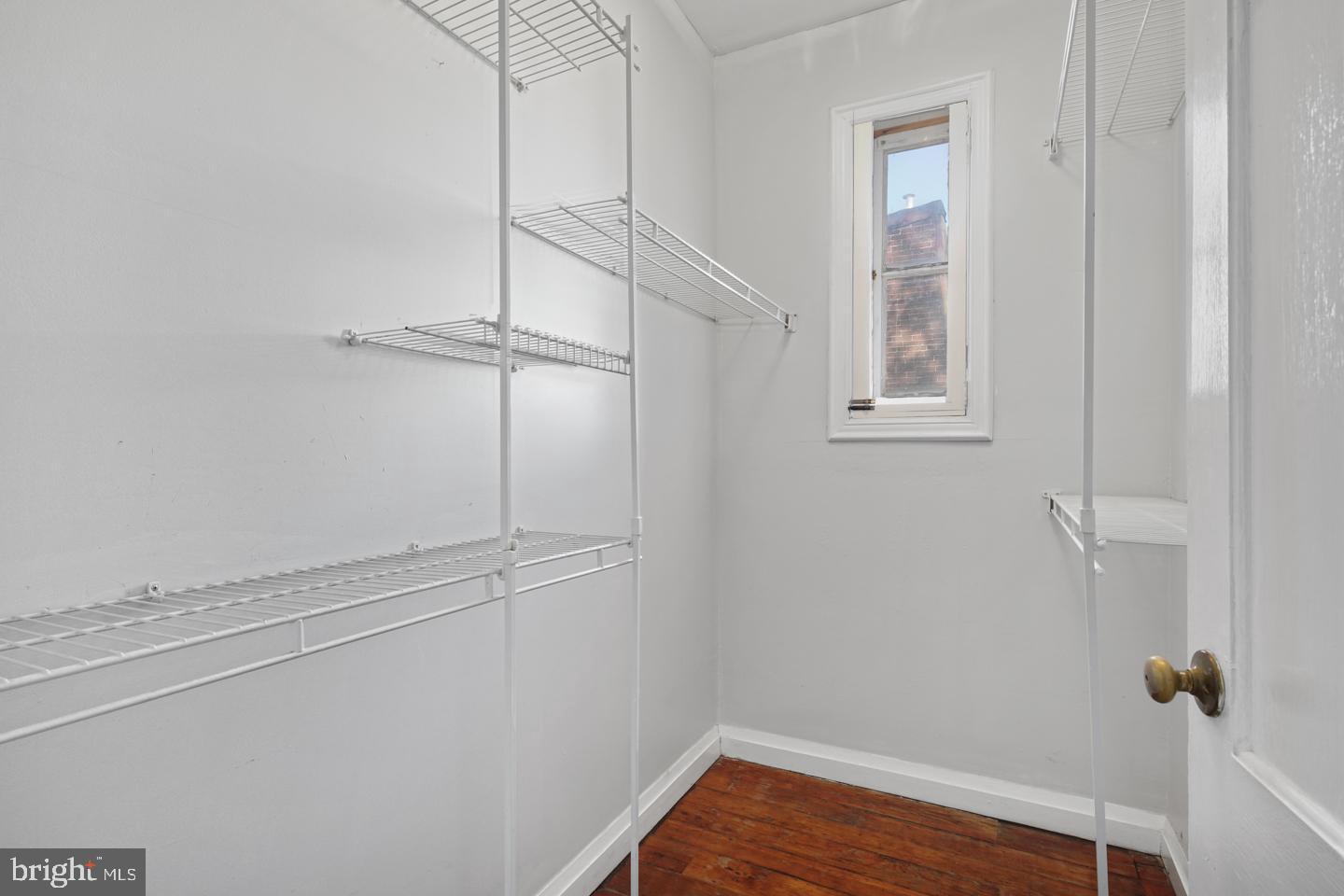 2324 Poplar Street, Unit 2F Philadelphia, PA 19130 - Photo 20 of 24 a view of a room with wooden floor and fan