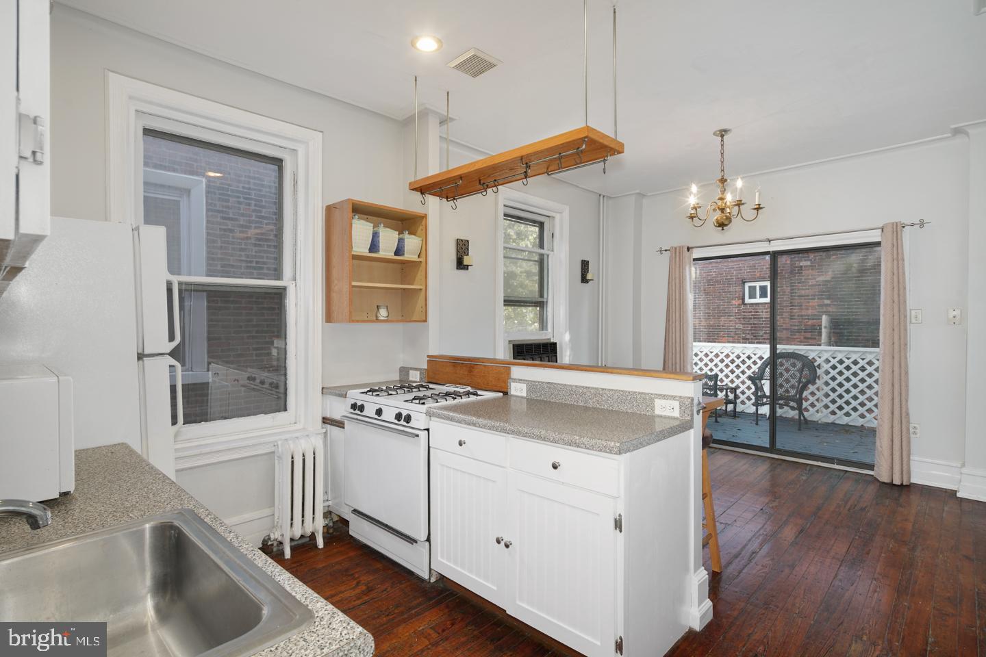 2324 Poplar Street, Unit 2F Philadelphia, PA 19130 - Photo 6 of 24 a spacious kitchen with a sink stove and refrigerator