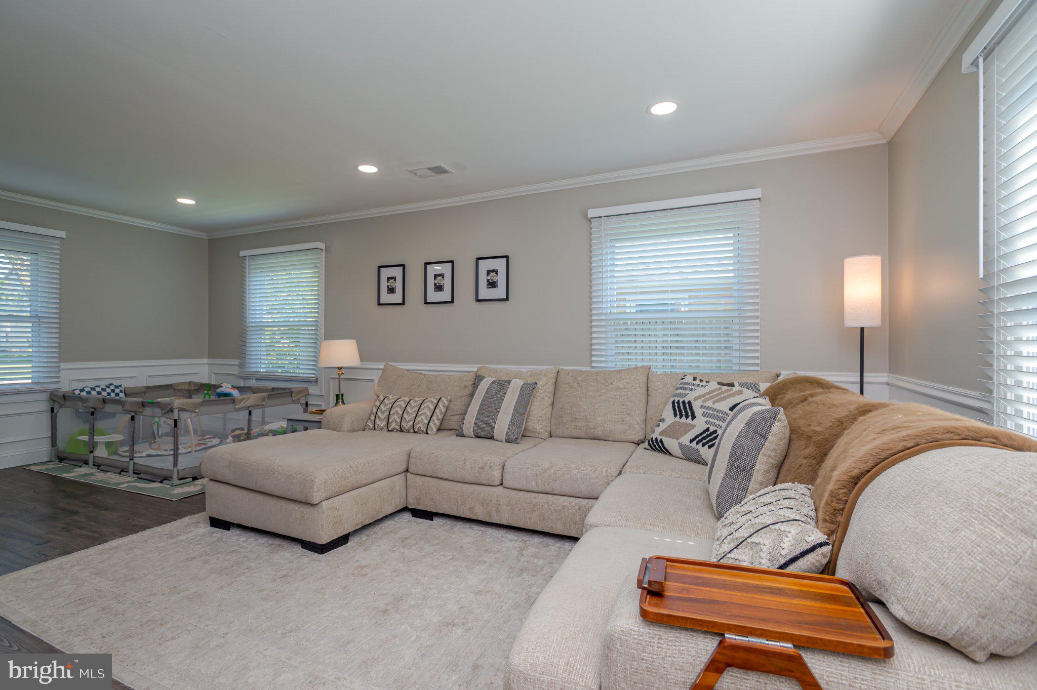 60 Midvale Lane Willingboro, NJ 08046 - Photo 6 of 24 a living room with furniture and a large window