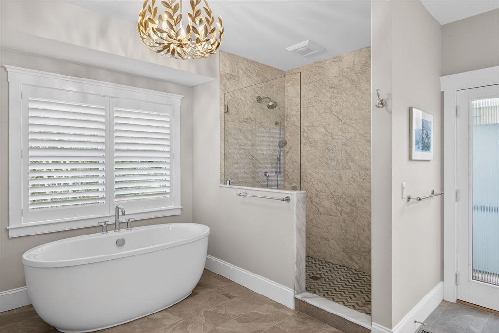 12 Talcott Pines Road Plymouth, MA 02360 - Photo 14 of 41 a bathroom with a bathtub and shower