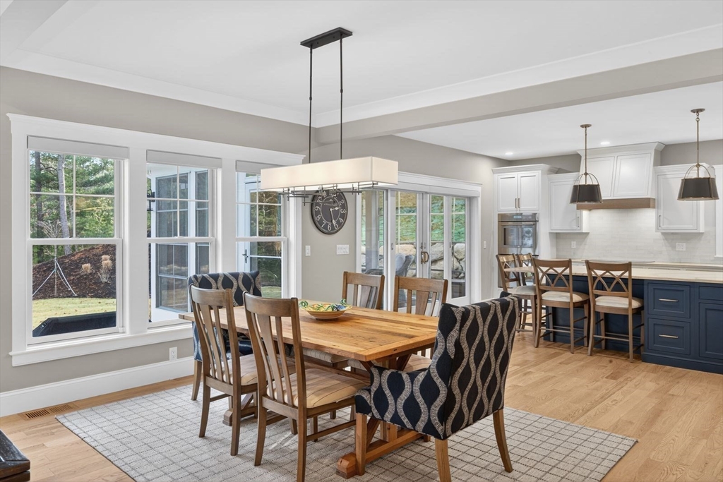 12 Talcott Pines Road Plymouth, MA 02360 - Photo 17 of 41 a view of a dining room with furniture window and wooden floor