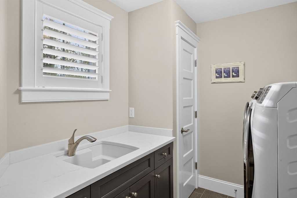 12 Talcott Pines Road Plymouth, MA 02360 - Photo 28 of 41 a bathroom with a sink and a mirror