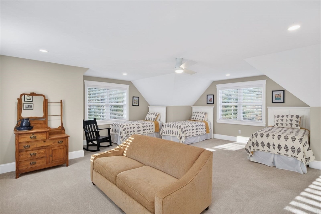 12 Talcott Pines Road Plymouth, MA 02360 - Photo 30 of 41 a bedroom with a large bed and a couch