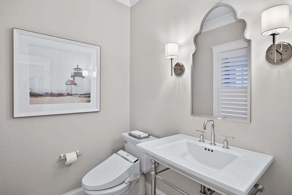 12 Talcott Pines Road Plymouth, MA 02360 - Photo 38 of 41 a bathroom with a toilet a sink and mirror