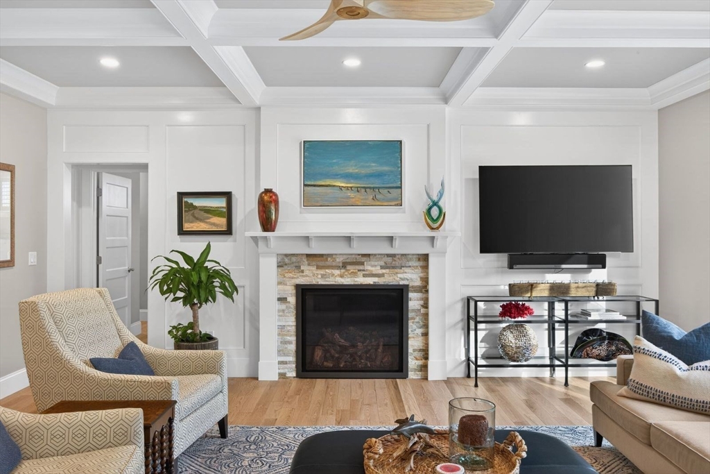12 Talcott Pines Road Plymouth, MA 02360 - Photo 9 of 41 a living room with furniture and a flat screen tv
