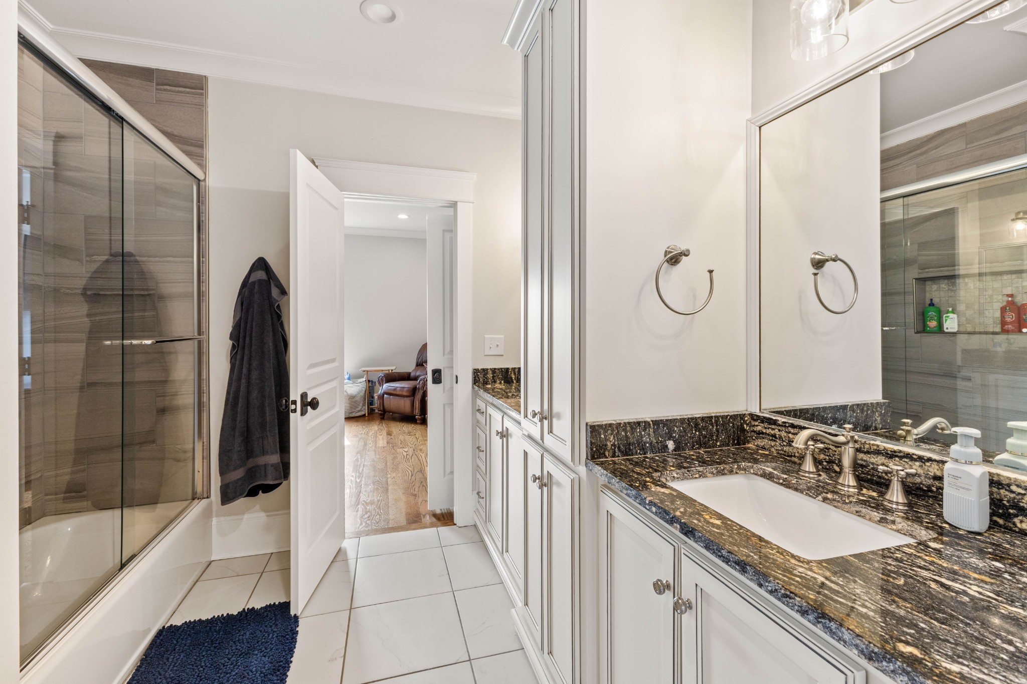1103 Rogues Fork Road Bethpage, TN 37022 - Photo 68 of 100 a bathroom with a granite countertop sink and a mirror