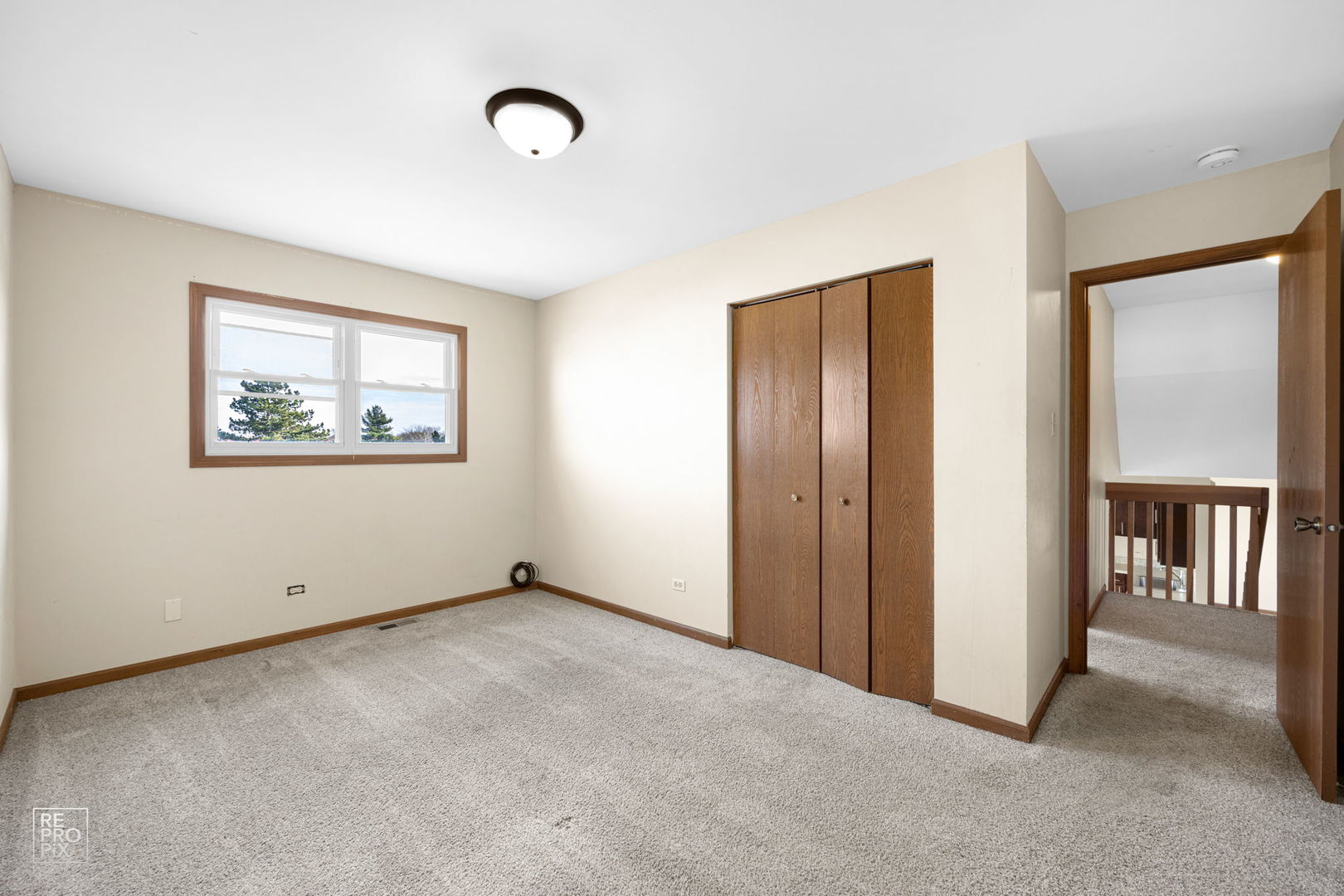 309 Wheatfield Road Matteson, IL 60443 - Photo 19 of 22 an empty room with windows