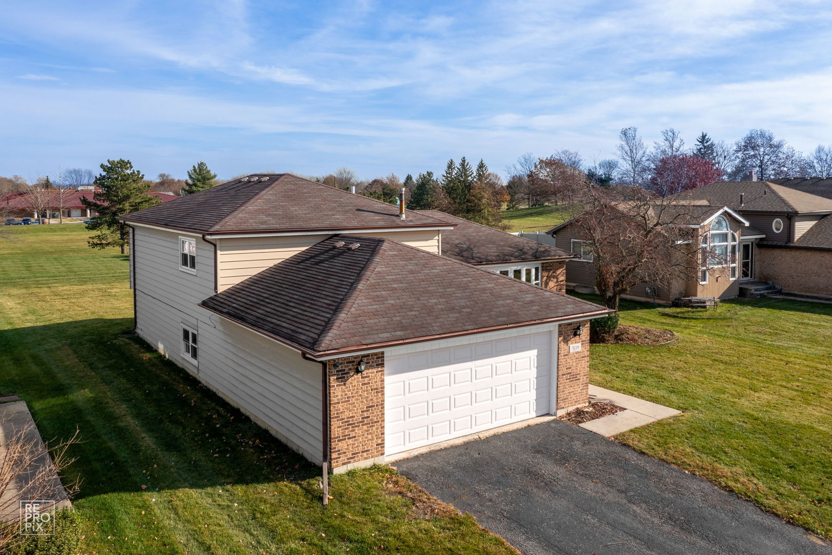 309 Wheatfield Road Matteson, IL 60443 - Photo 4 of 22 a view of a house with a yard