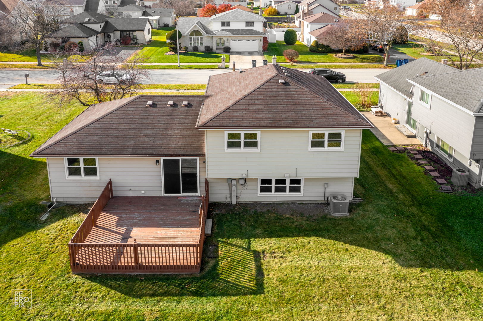 309 Wheatfield Road Matteson, IL 60443 - Photo 5 of 22 a aerial view of a house with a yard table and chairs