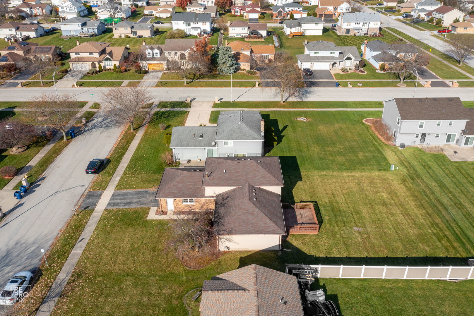 309 Wheatfield Road Matteson, IL 60443 - Photo 6 of 22 an aerial view of residential houses with outdoor space
