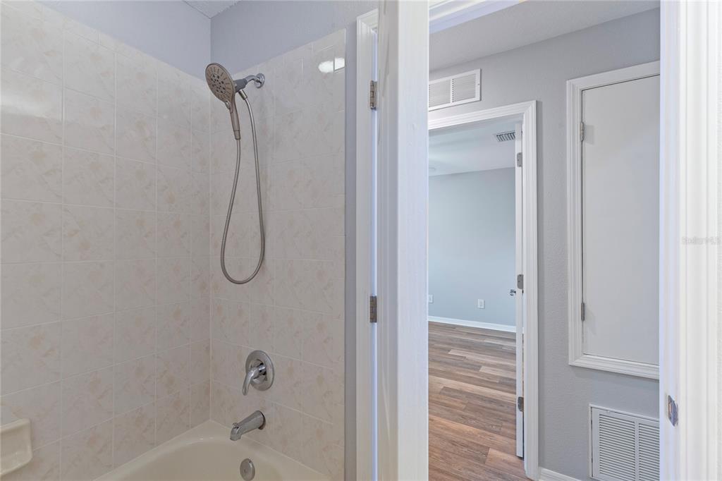 1455 Hidden Court Tarpon Springs, FL 34689 - Photo 23 of 30 a bathroom with a bathtub