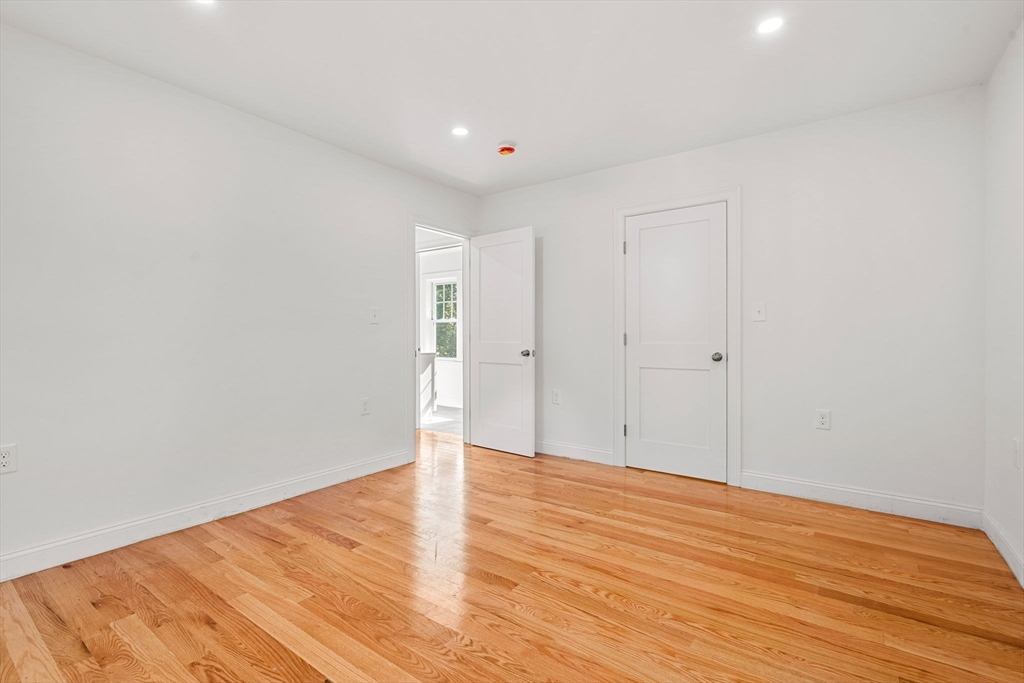 29 Willson Street Salem, MA 01970 - Photo 21 of 41 a view of an empty room with wooden floor