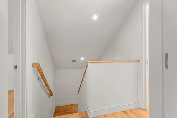 a view of hallway with stairs