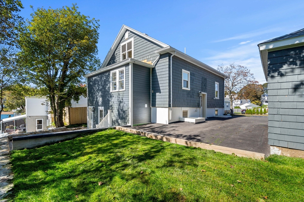 29 Willson Street Salem, MA 01970 - Photo 4 of 41 a view of a house with a yard