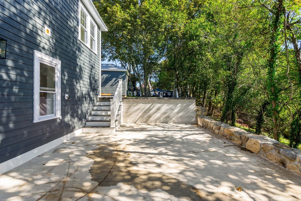 29 Willson Street Salem, MA 01970 - Photo 6 of 41 a view of a house with a yard