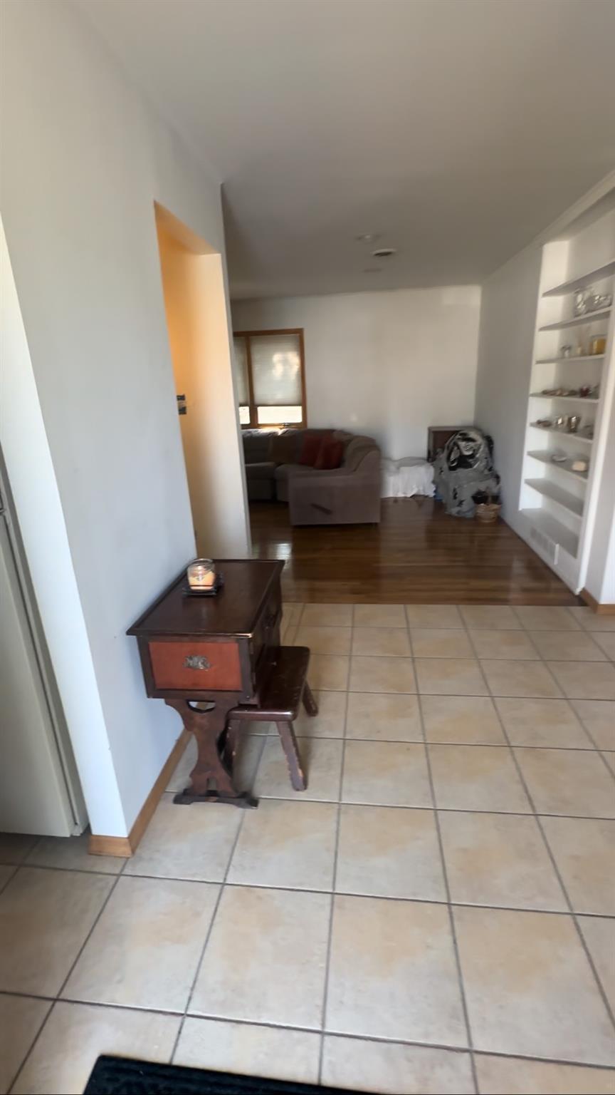 1 Scott Place Plainview, NY 11803 - Photo 2 of 5 a living room with furniture
