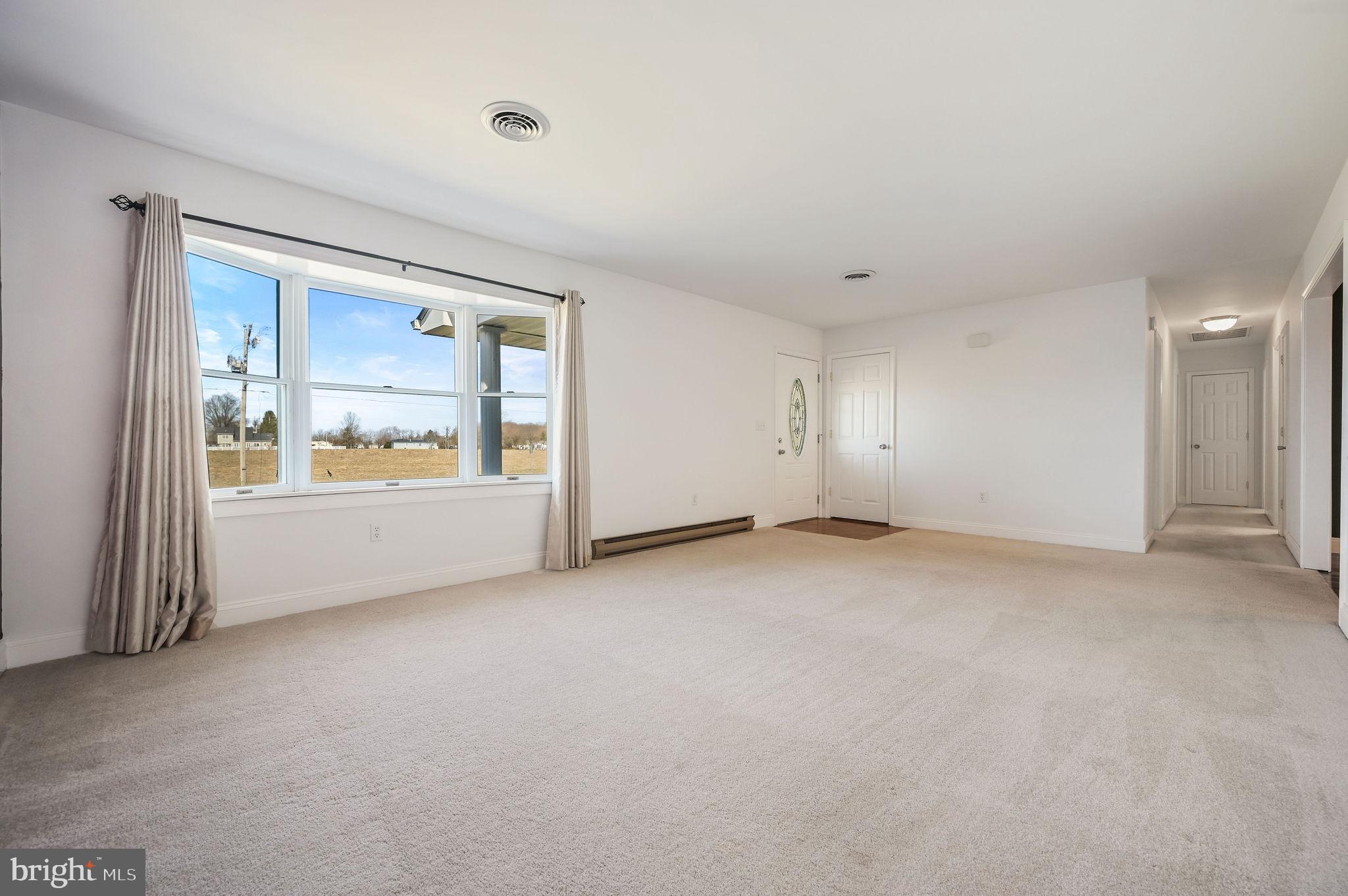 231 East Evens Road Viola, DE 19979 - Photo 11 of 36 a view of an empty room with a window