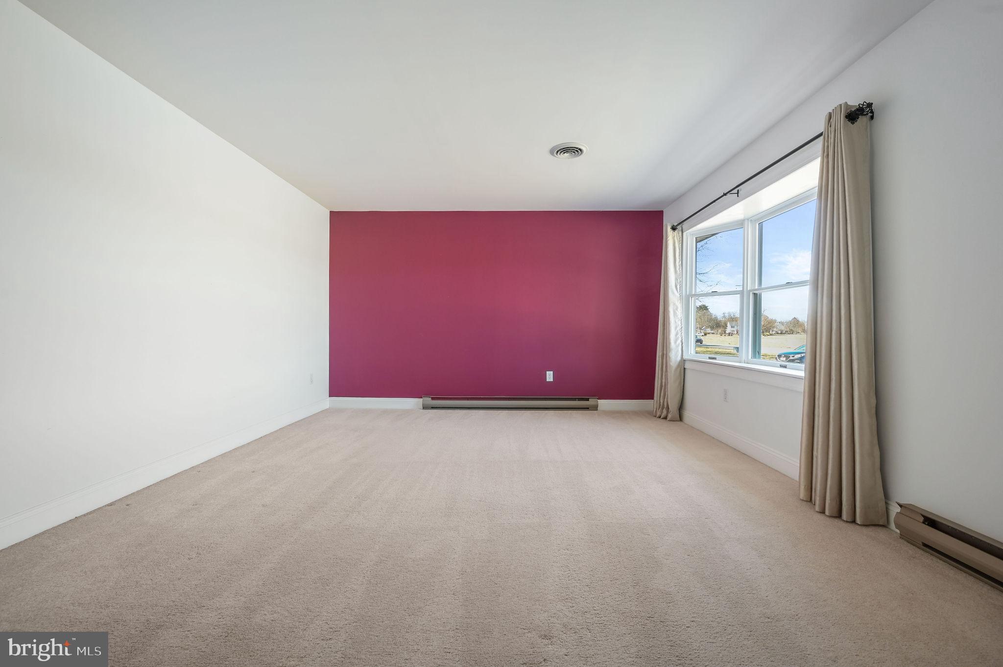 231 East Evens Road Viola, DE 19979 - Photo 12 of 36 a view of an empty room with a window