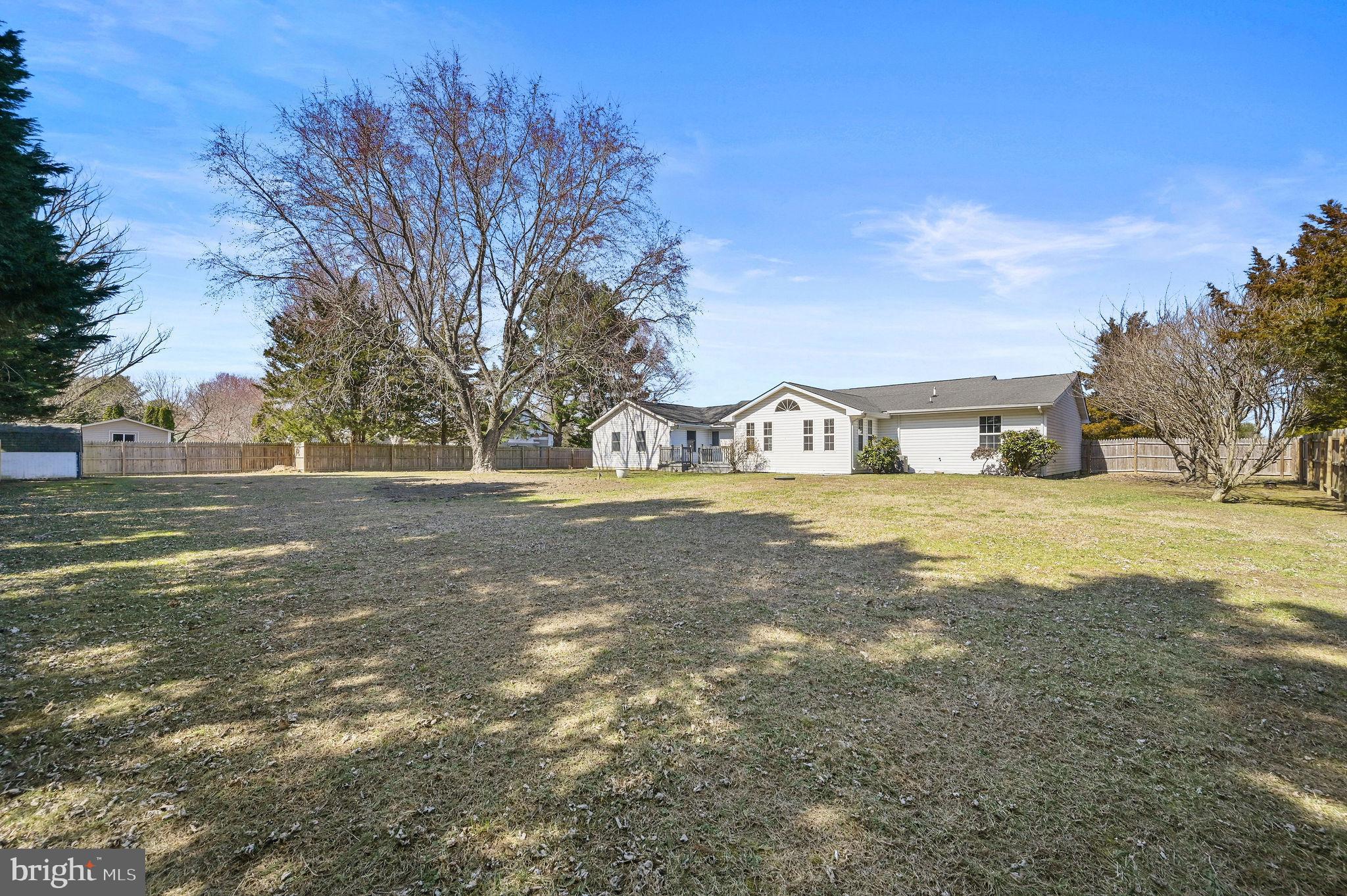 231 East Evens Road Viola, DE 19979 - Photo 2 of 36 a view of pool and trees