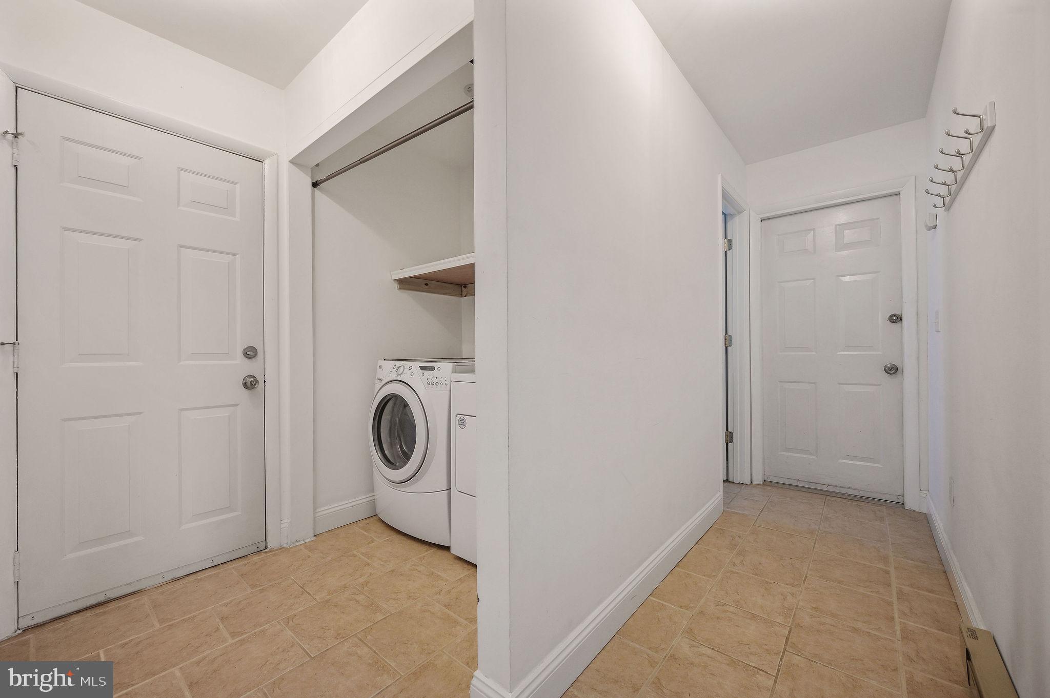 231 East Evens Road Viola, DE 19979 - Photo 27 of 36 a view of a storage & utility room with washer and dryer