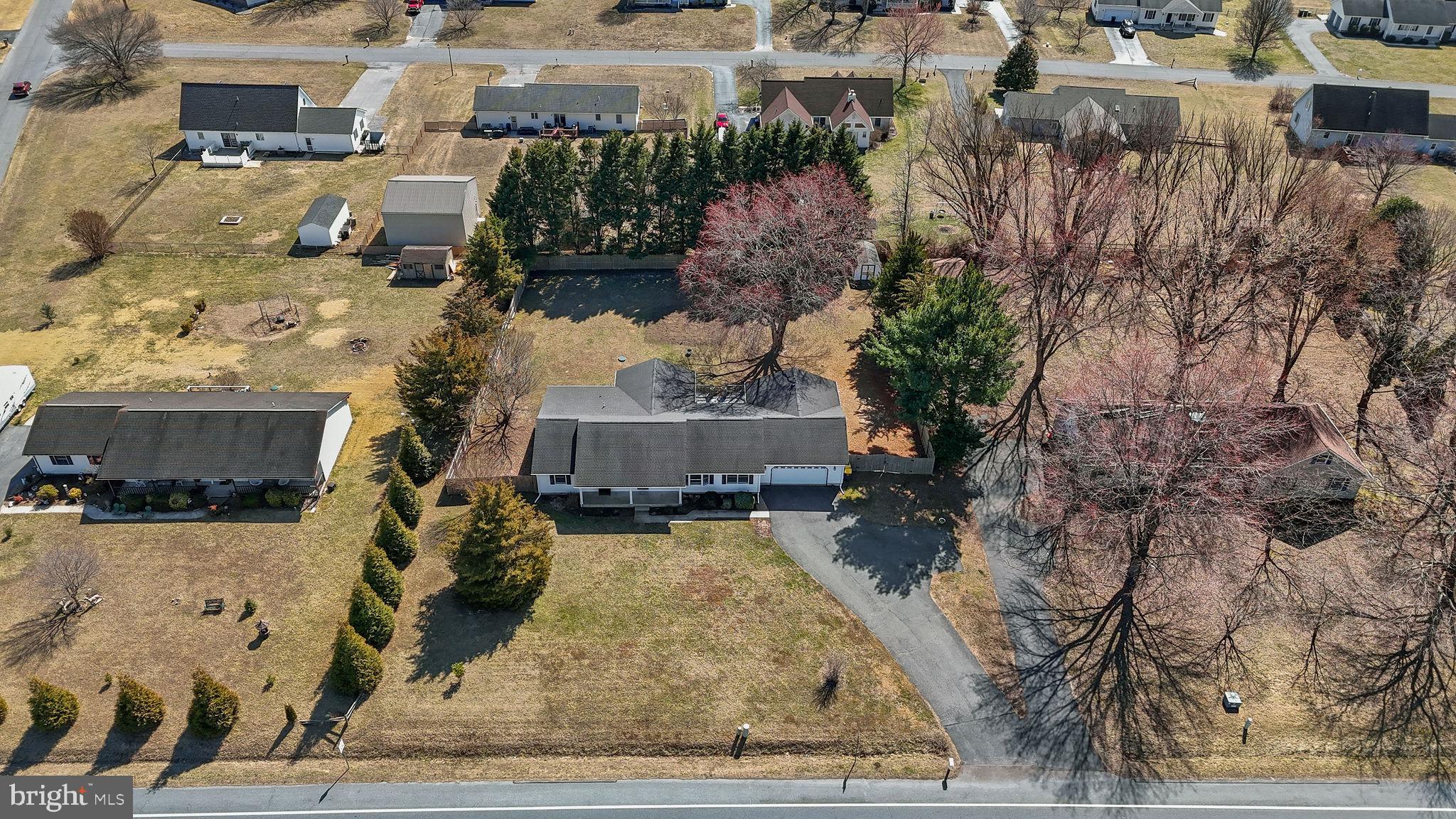 231 East Evens Road Viola, DE 19979 - Photo 4 of 36 an aerial view of a house with a yard
