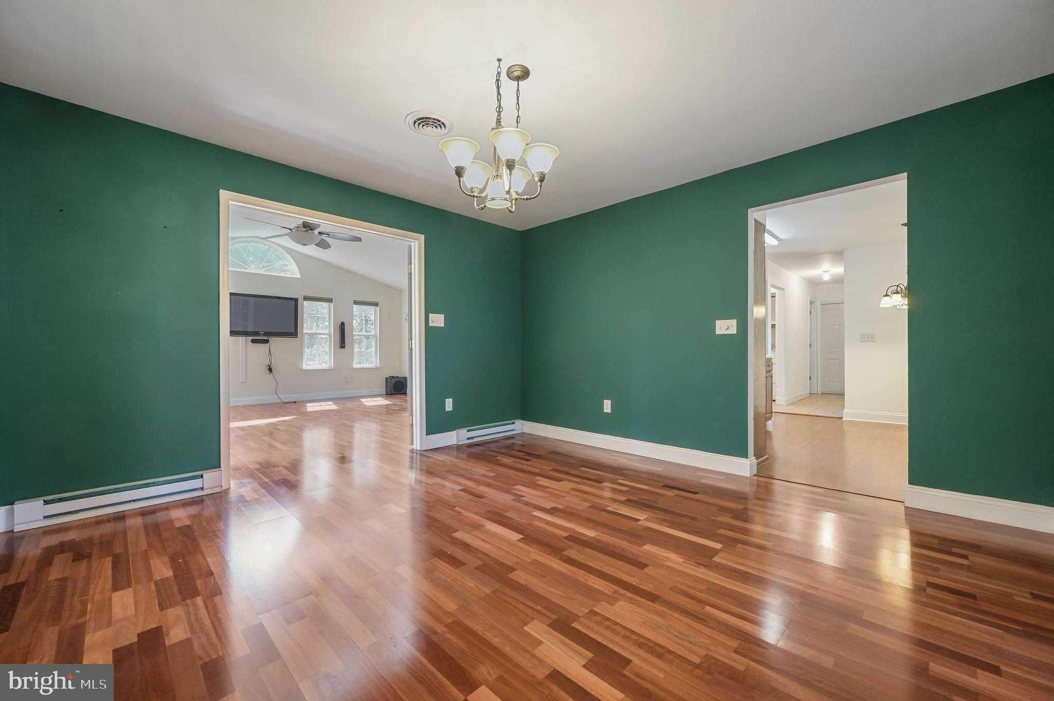 231 East Evens Road Viola, DE 19979 - Photo 8 of 36 wooden floor in an empty room with a window