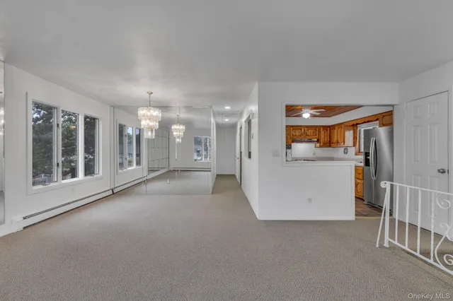 a view of a storage & utility room and windows