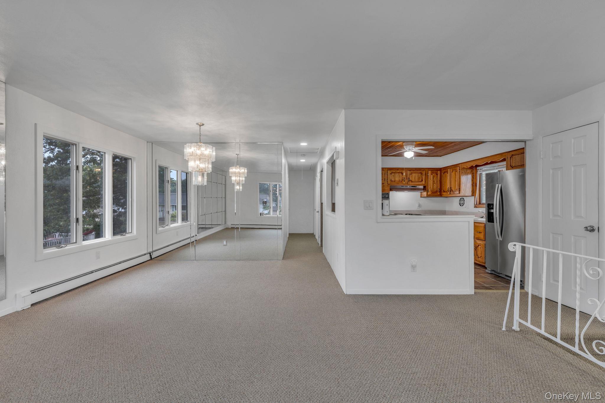 813 Windmill Avenue West Babylon, NY 11704 - Photo 12 of 32 a view of a storage & utility room and windows