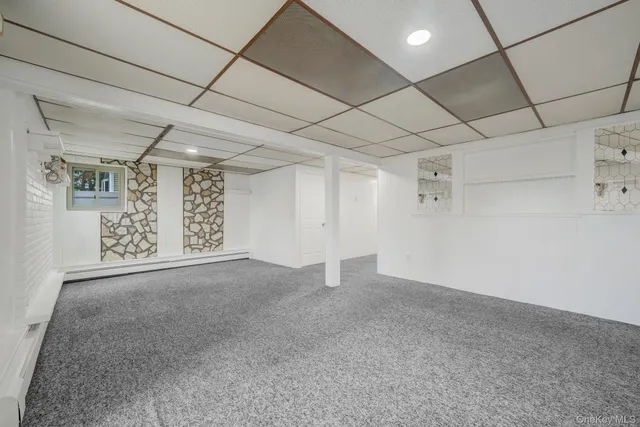 a view of a livingroom with natural light