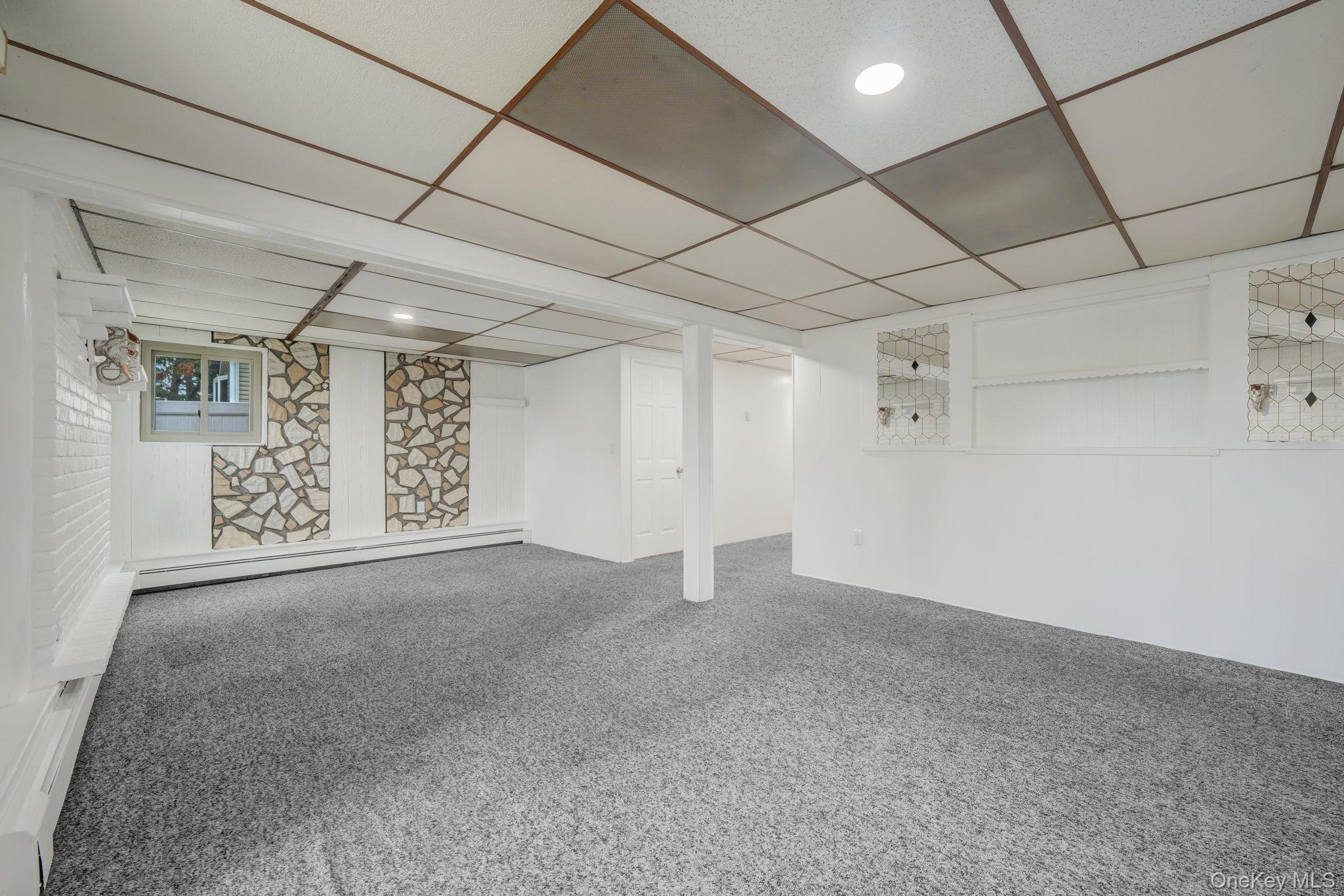 813 Windmill Avenue West Babylon, NY 11704 - Photo 20 of 32 a view of a livingroom with natural light