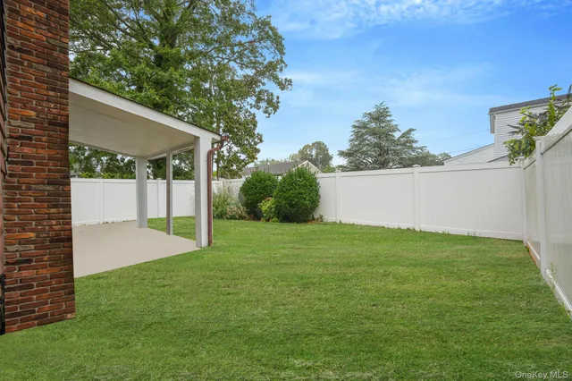 a view of a backyard with a garden