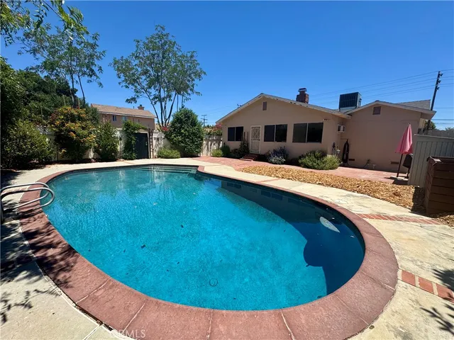a house view with a outdoor space