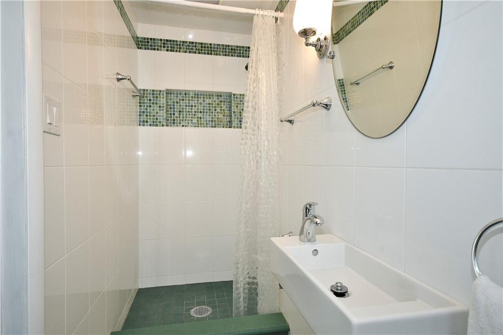 1360 Washington Road Pittsburgh, PA 15228 - Photo 20 of 44 a bathroom with a sink and a mirror