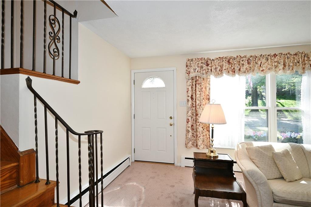 1360 Washington Road Pittsburgh, PA 15228 - Photo 2 of 44 a living room with furniture and a large window