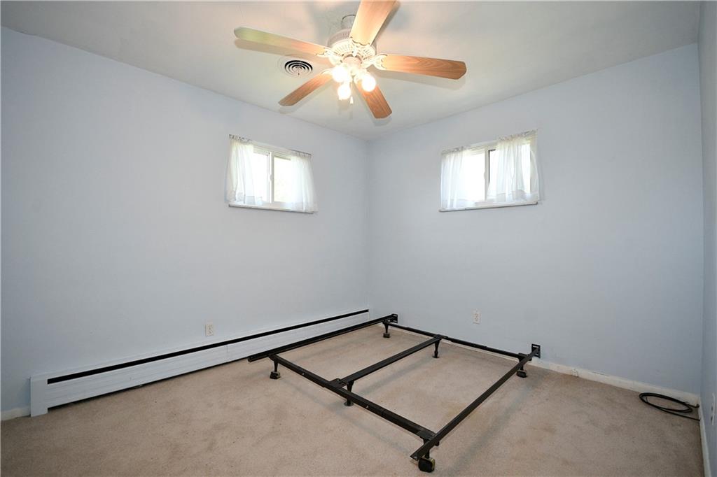 1360 Washington Road Pittsburgh, PA 15228 - Photo 23 of 44 a view of a room with windows and ceiling fan