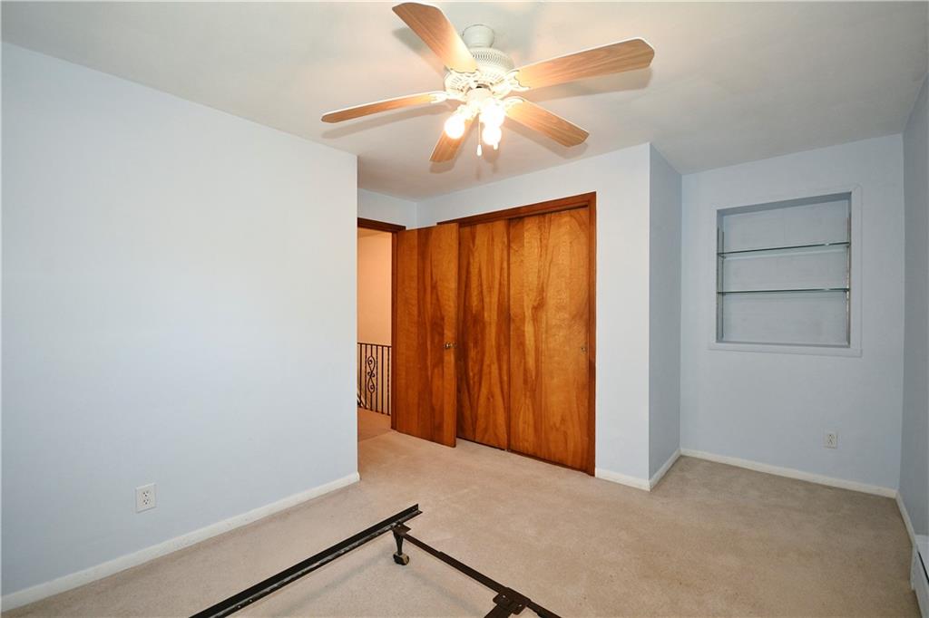 1360 Washington Road Pittsburgh, PA 15228 - Photo 24 of 44 an empty room with chandelier fan