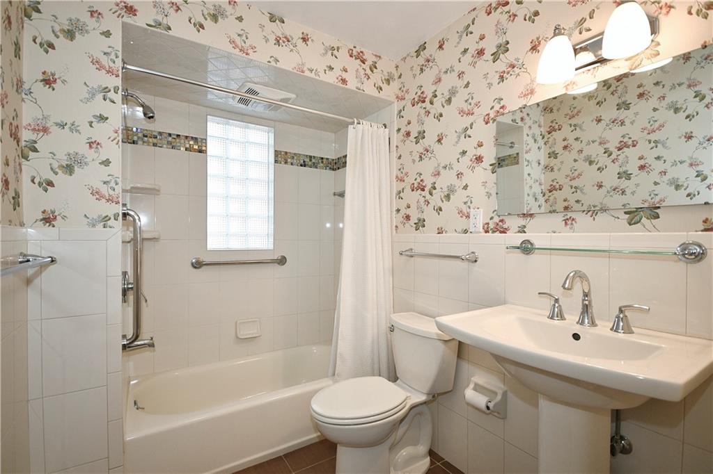 1360 Washington Road Pittsburgh, PA 15228 - Photo 27 of 44 a bathroom with a sink a toilet and shower