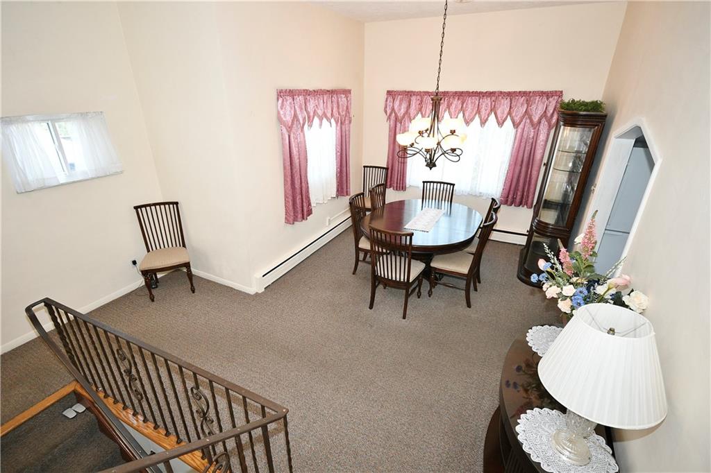 1360 Washington Road Pittsburgh, PA 15228 - Photo 7 of 44 a living room with furniture and a potted plant