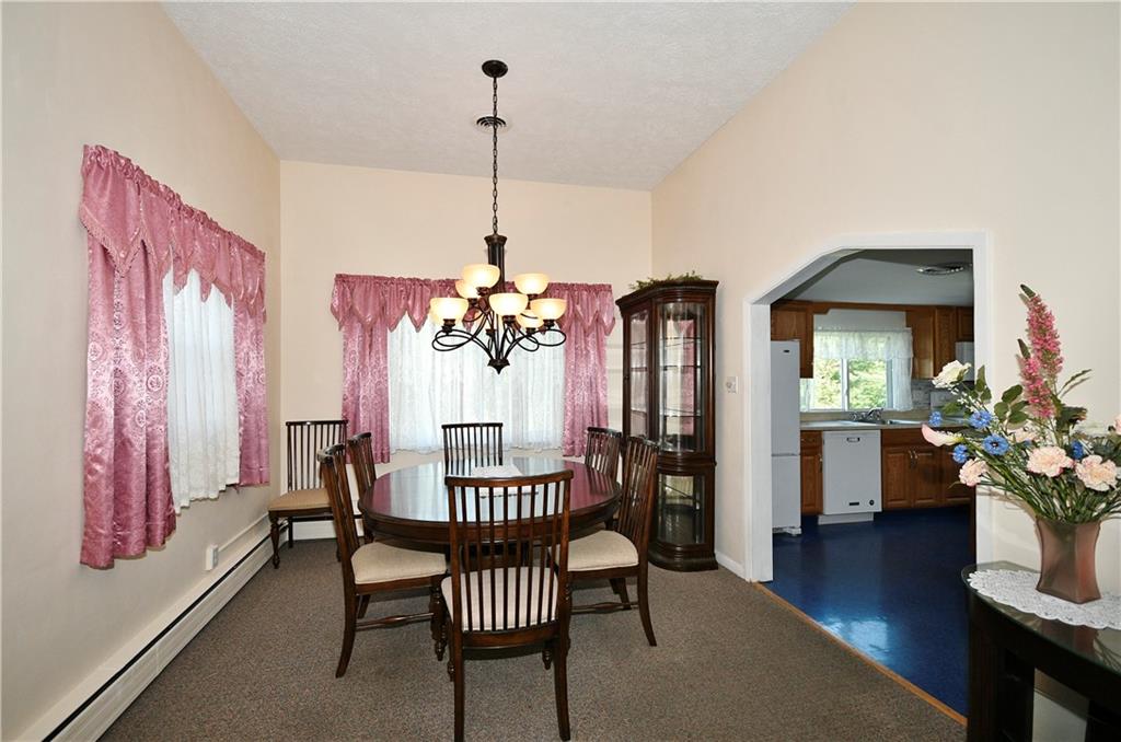 1360 Washington Road Pittsburgh, PA 15228 - Photo 9 of 44 a view of a livingroom with furniture and hardwood floor
