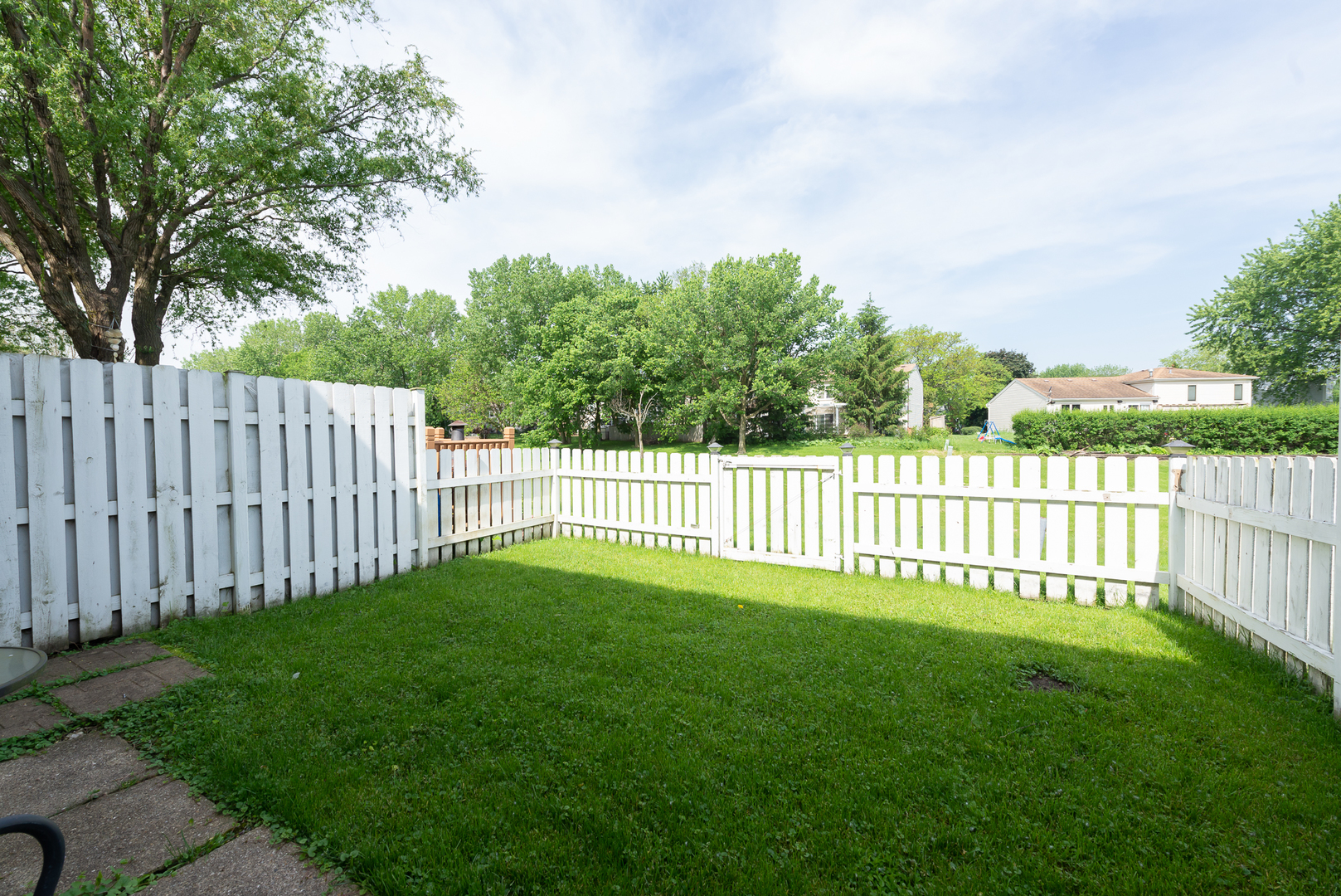322 Rodenburg Road Roselle, IL 60172 - Photo 14 of 17 a view of a wooden fence