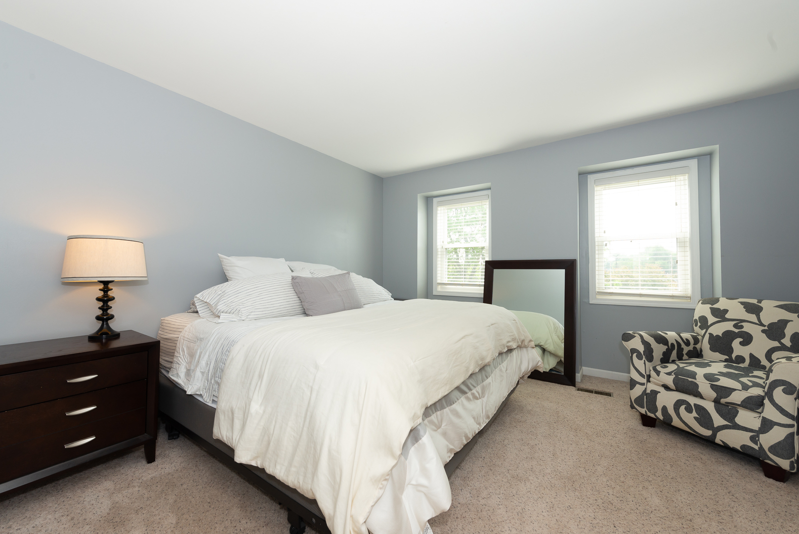 322 Rodenburg Road Roselle, IL 60172 - Photo 4 of 17 a bedroom with a bed and a window